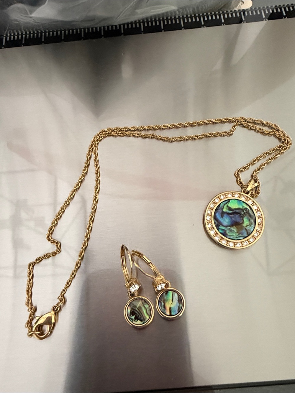 Nina Ricci Gold-Tone Abalone Pendant Necklace with Crystal Halo